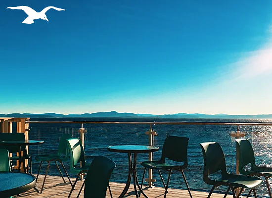 Outdoor Balcony with fantastic fjord view 6 at the Banquet facilities at Hindrum Fjordsenter in Norway at sunny day