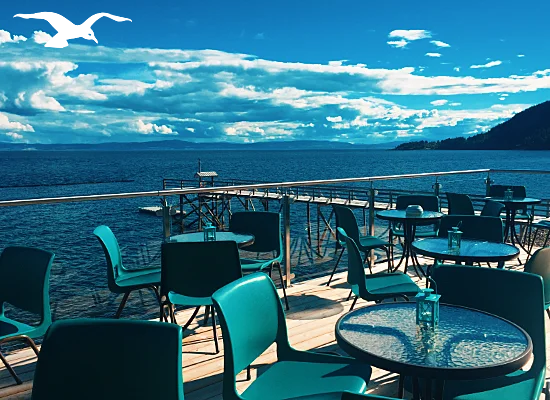Outdoor Balcony with fantastic fjord view at the Banquet facilities at Hindrum Fjordsenter in Norway at sunny day
