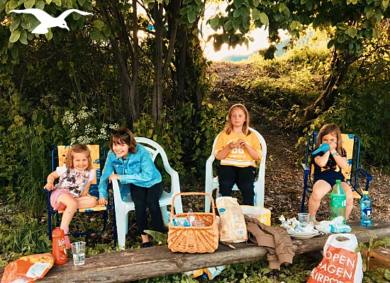 Camping guests Hindrum Fjordsenter in Norway on a sunny day