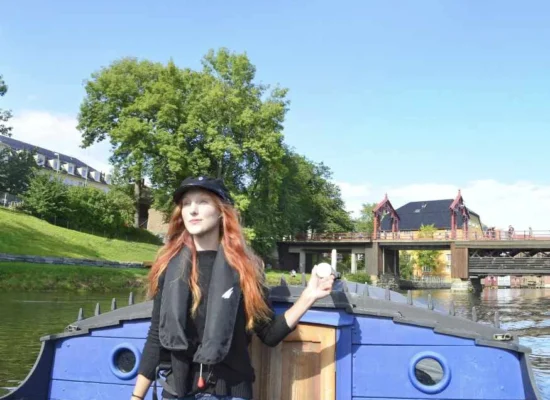 Trondheim by boat 
Captain steering