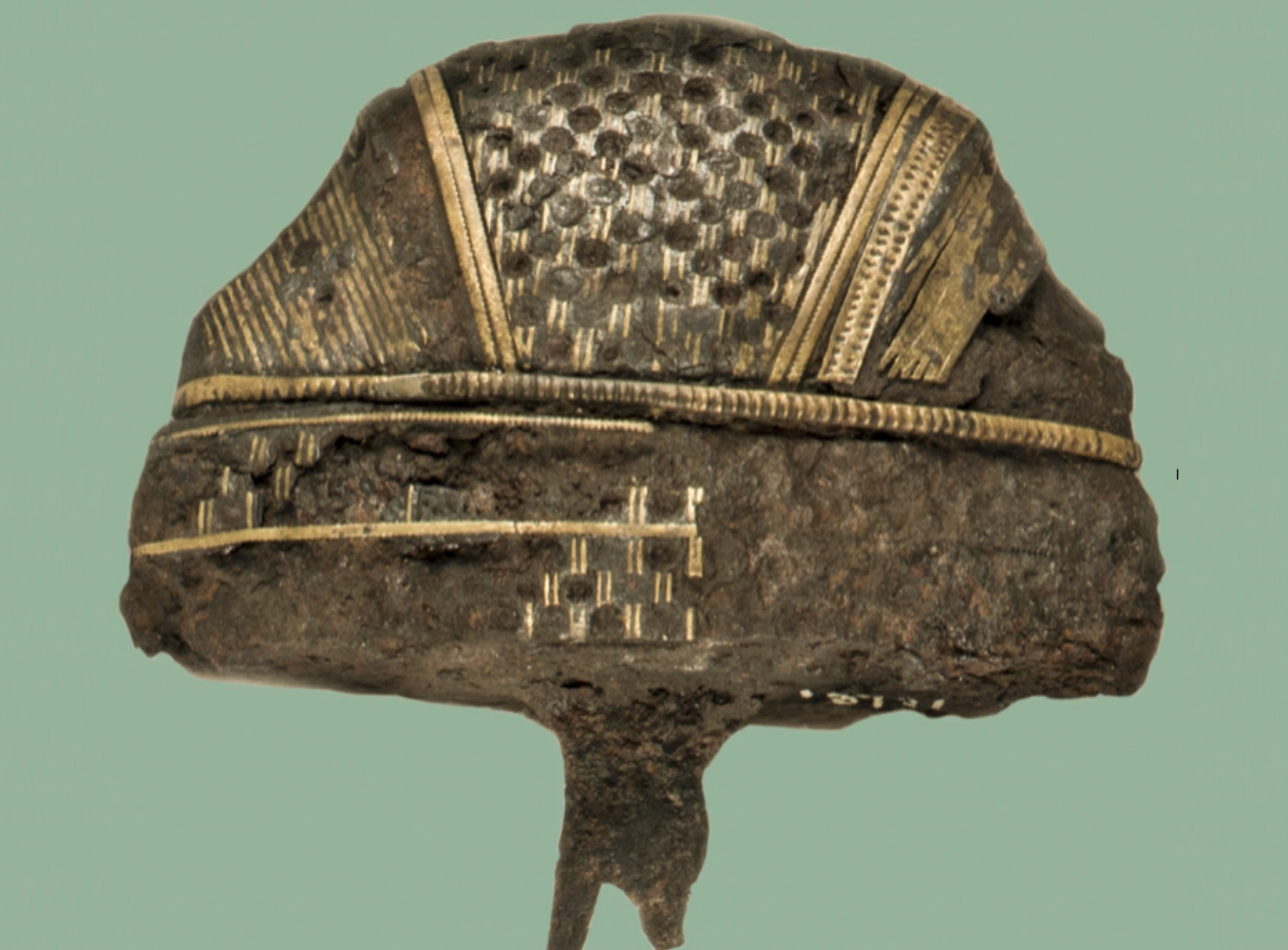 Decorated sword hilt discovered during archaeological excavations in Norway