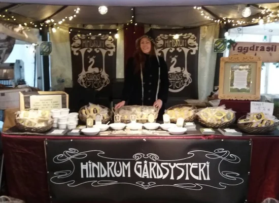Hindrum Gårdsysteri cheese stall at a local food market in Norway